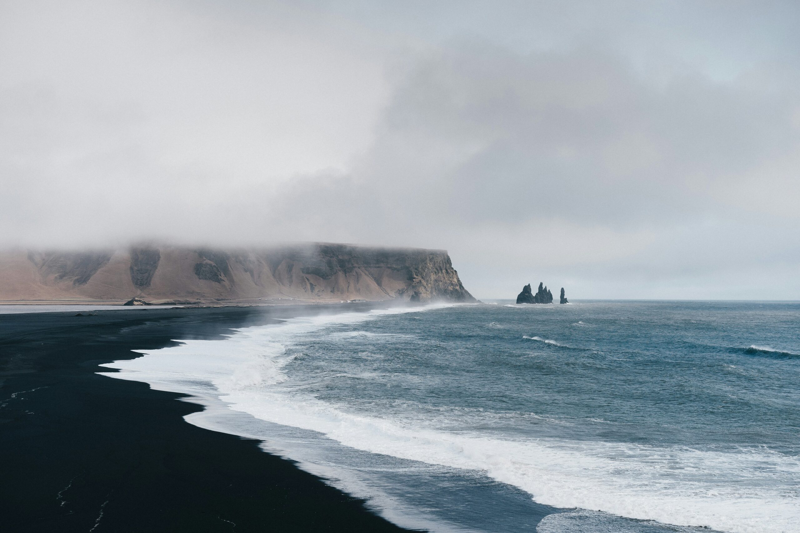 Iceland dramatic volcanic landscape travel costs daily budget guide 2026